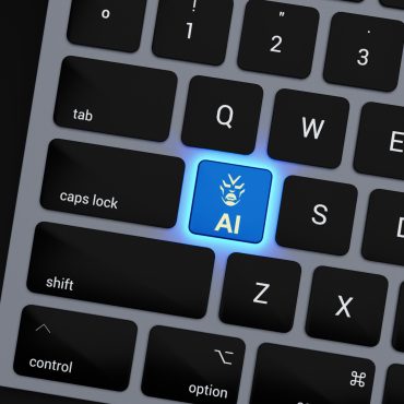a-close-up-of-a-keyboard-with-a-blue-button